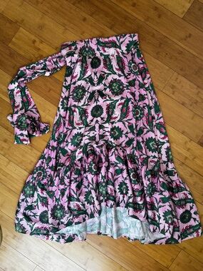DELFI satin asymmetrical maxi skirt with a ruffle and ties in pink